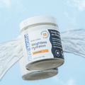 Lotion bottle with wings on a blue sky background